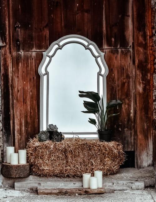 aesthetic garden with a window-shaped mirror