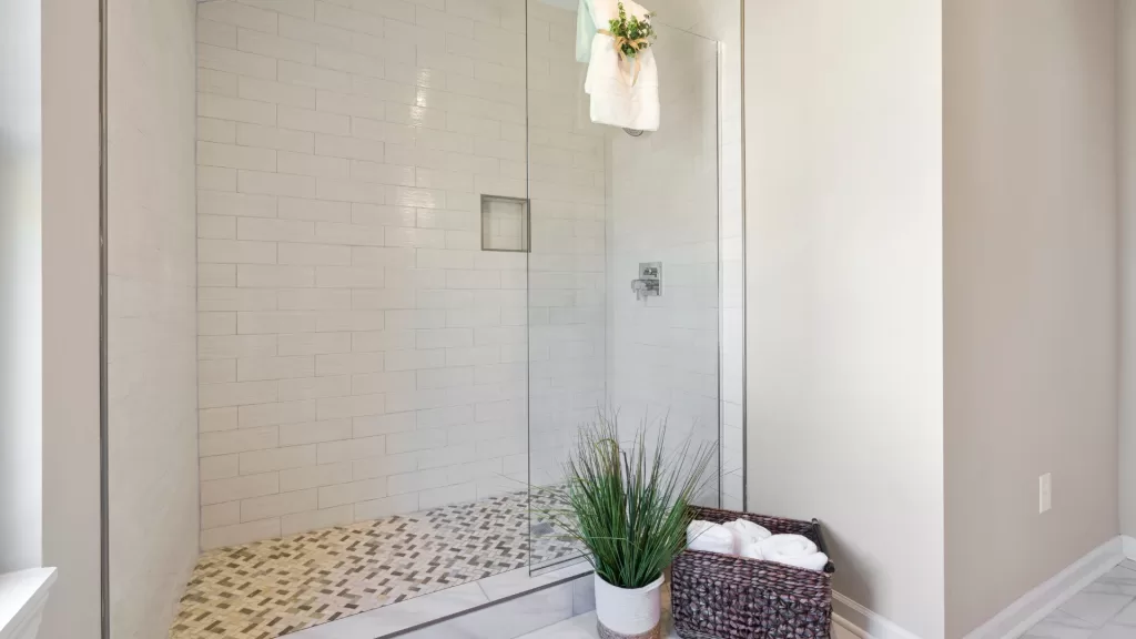 Install Frameless Showers with Marble Tile Accent Design 