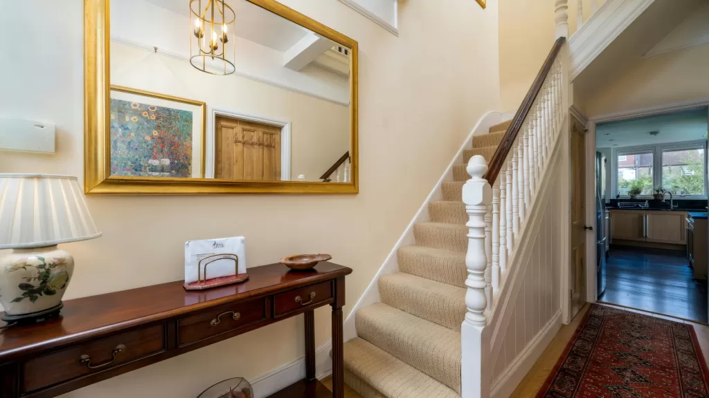 Entryway Mirror Placement to Brighten Narrow Hallway
