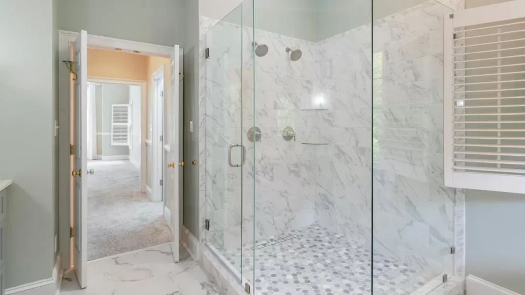 Install Frameless Showers with Marble Tile Accent Design 